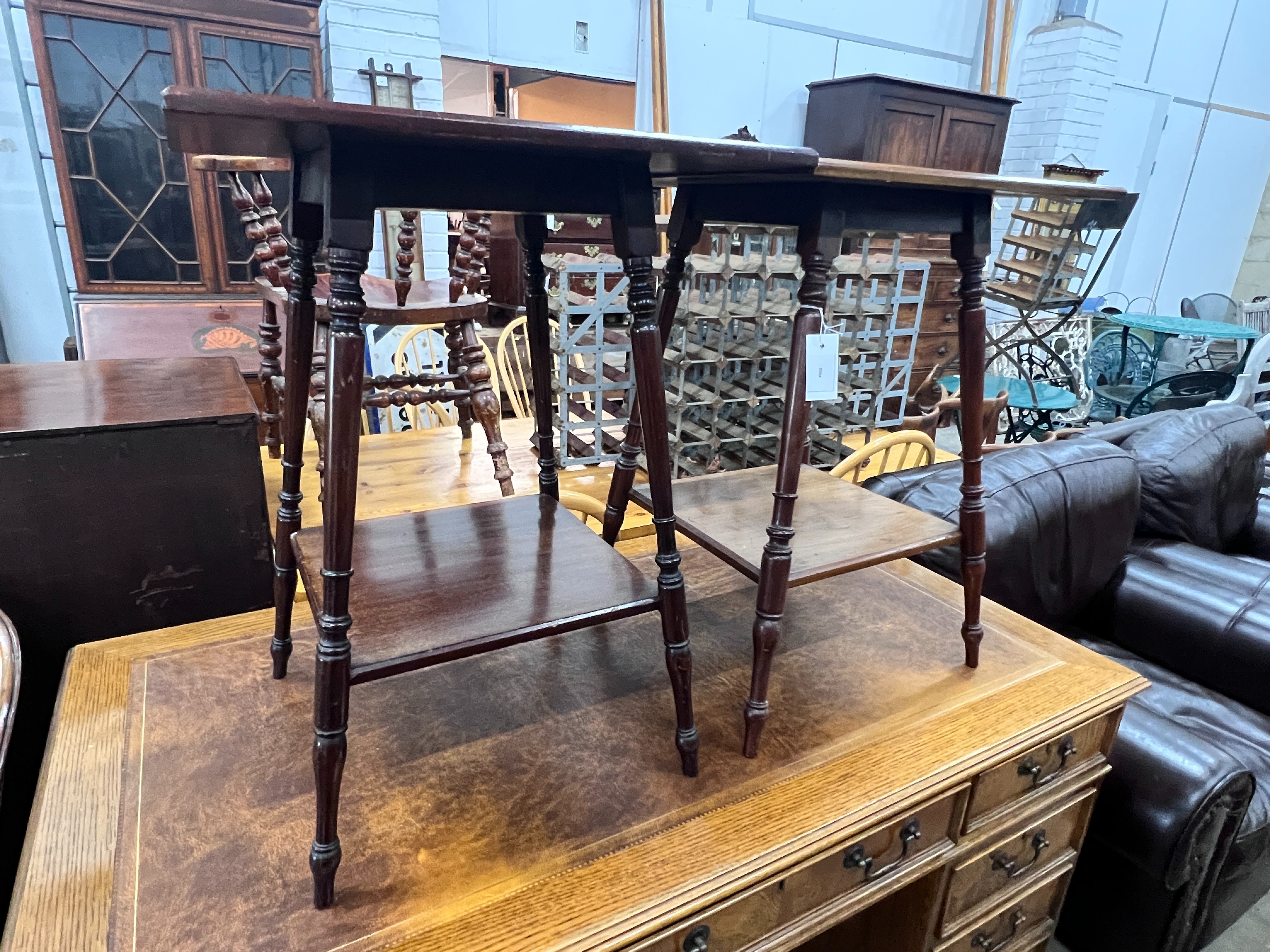 A near pair of late Victorian mahogany and walnut square two tier bedside tables, 48cm, height 66cm